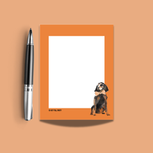 Hound Dog Wearing an Orange and White Necktie Notepad