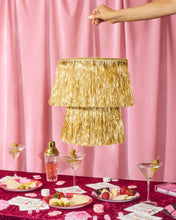 xo, Fetti - Gold Fringe Tinsel Chandelier | gold decor, party chandelier