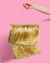 xo, Fetti - Gold Fringe Tinsel Chandelier | gold decor, party chandelier