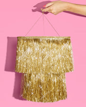 xo, Fetti - Gold Fringe Tinsel Chandelier | gold decor, party chandelier